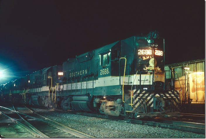 Southern Ry. GP35 2688 and 5025 wait for a crew before proceeding on to Potomac Yard on Dec. 26, 1977. Note the ALCo trucks. Lynchburg VA.